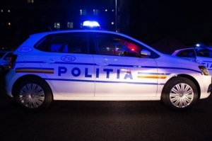 Femeie împușcată de polițiști. Se afla într-o mașină care nu a oprit la semnal