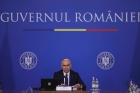 Bolojan are ARICE la buzunar! O instituție esențială pentru aderarea la OCDE propusă spre desființare pentru că ne costă prea mult