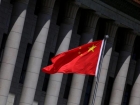 China îndeamnă naţiunile în dezvoltare să se opună "unei taxe nerealiste" în transportul maritim promovata de Franta
