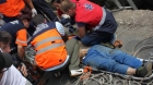 Doi muncitori au căzut de pe o schelă de la 50 de metri înălțime