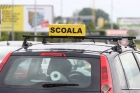 Instructor auto prins în flagrant în timp ce încerca să mituiască un polițist examinator