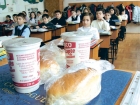 Mari producători de lactate, amendaţi pentru licitații trucate