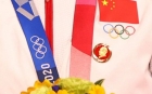 Scandal uriaş la JO 2020. Două campioane olimpice i-au adus un omagiu pe podium "celui mai mare criminal din istorie"