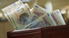 Schimbări majore intră în vigoare la 1 februarie. Cum îi afectează pe români la buzunar