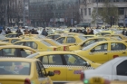 Transportatorii care au blocat Bucurestiul renunta la protest. Guvernul le-a promis ca opreste pirateria si ii lasa sa circule tot cu masinile vechi