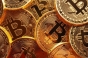 Bitcoin a depăşit pentru prima oară 16.000 de dolari pe unitate