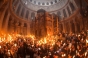 Când ajunge Sfânta Lumină de la Ierusalim în București. Miracolul aprinderii spontane deasupra mormântului lui Iisus
