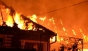 O femeie și-a ucis mama în Filipeștii de Pădure, după care a dat foc casei