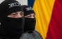 Român reţinut pentru acte de terorism