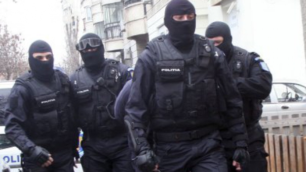 Perchezitii DIICOT in Bucuresti si in 7 judete, la membrii unei grupari specializate in spalarea banilor