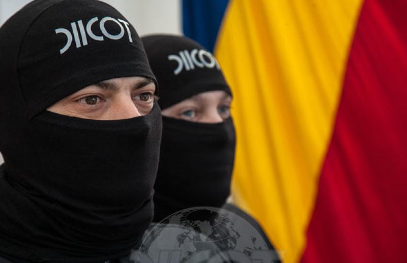 Român reţinut pentru acte de terorism