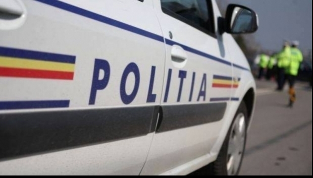 Scandal în stradă, oprit cu focuri de armă trase de poliţişti