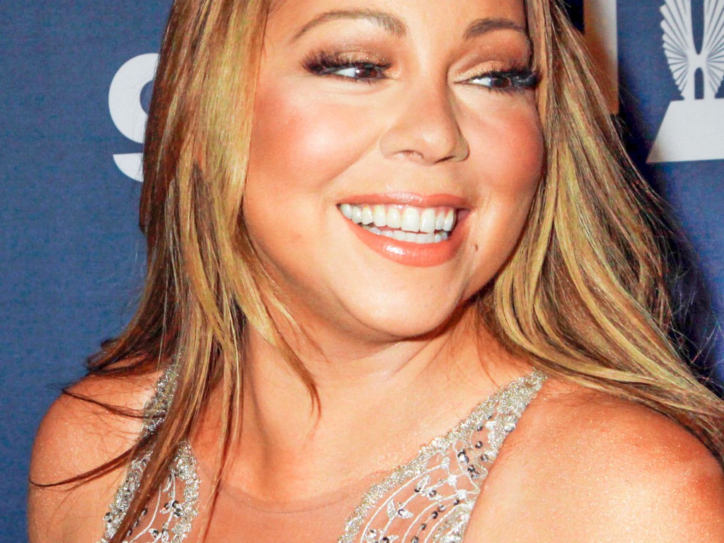 Sora cântăreței Mariah Carey a fost arestată pentru prostituție